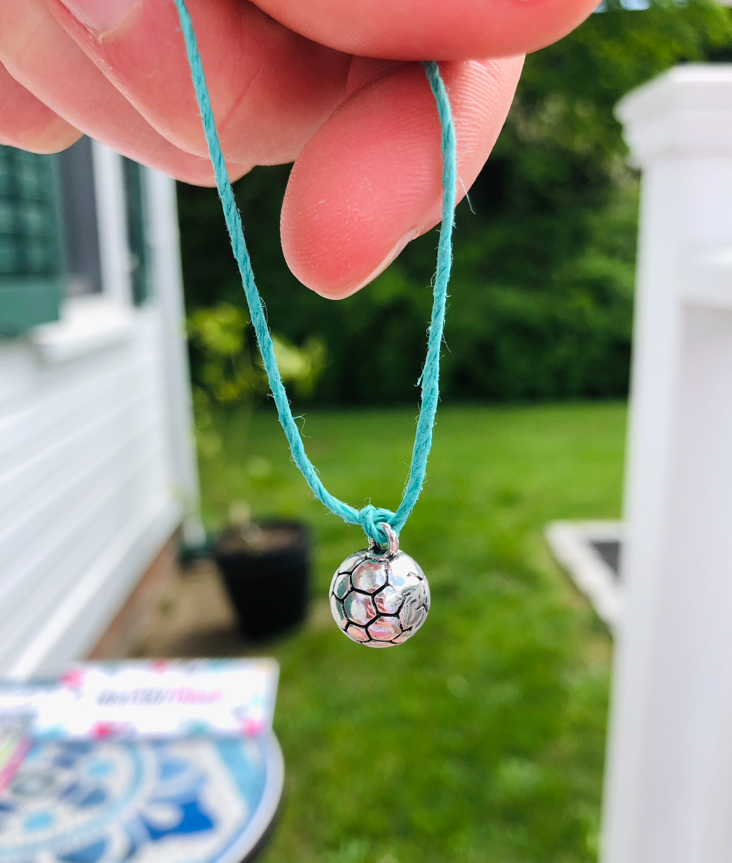 soccer ball charm bead on teal string bracelet